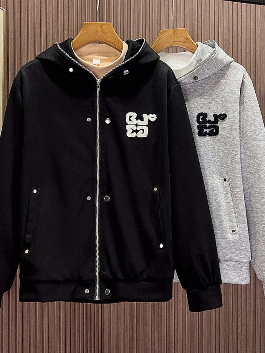 Men's black zippered hoodie with buttoned pockets and embroidered detail.