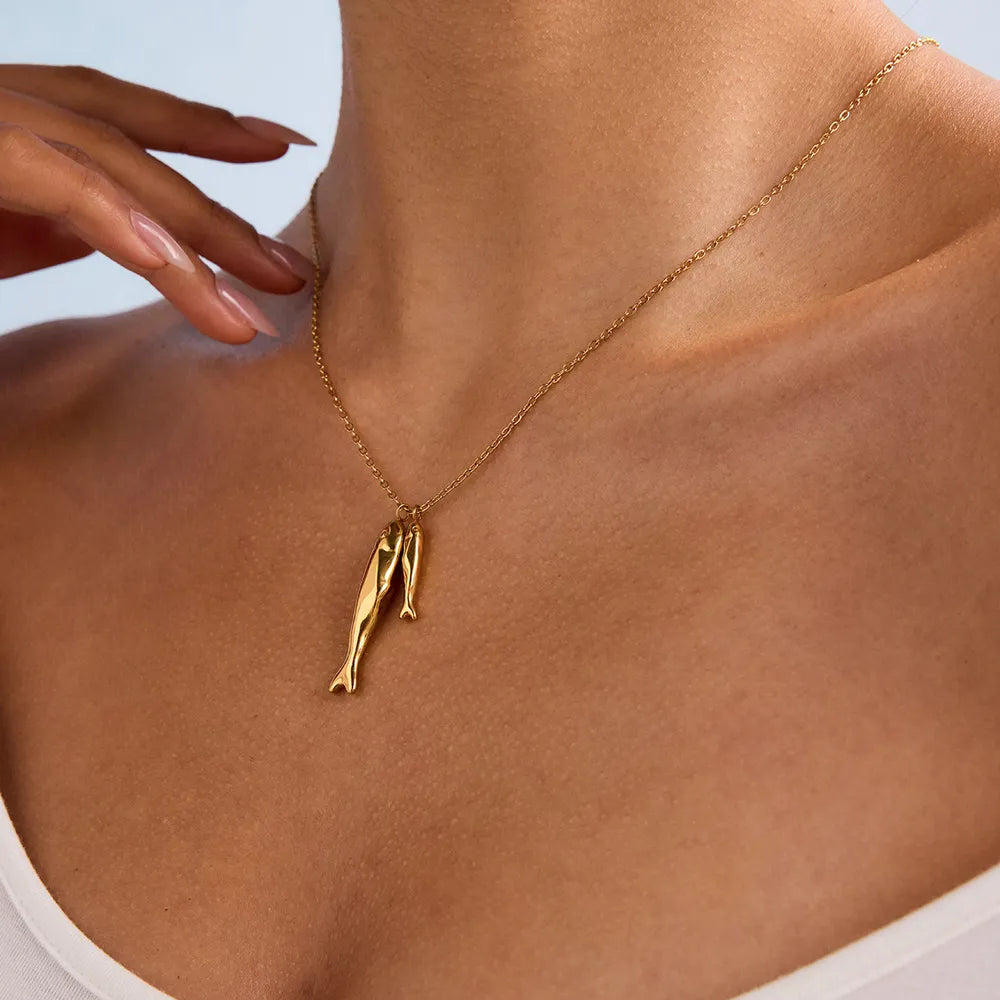 necklace in gold featuring delicate chain and slim fit