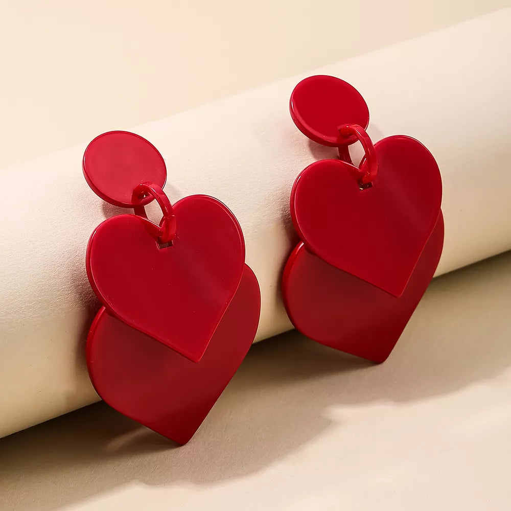 earrings in red featuring drop design and drop fit