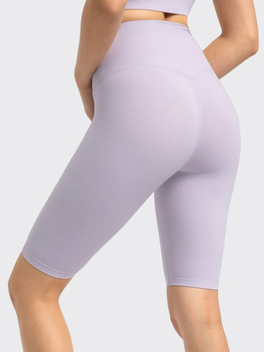 Sculpted Active Bike Shorts in Heliotrope Purple with V-shaped back seam detail.