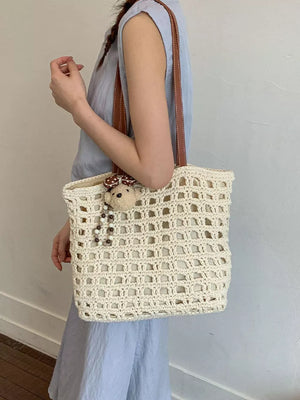 handbag featuring geometric in brown with Straw weaving Imported Size &amp texture