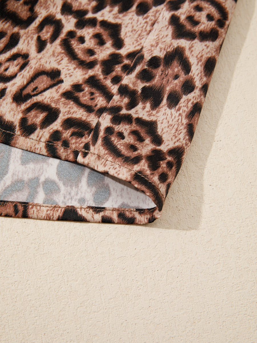 Leopard print blouse with puff sleeves and bow tie detail