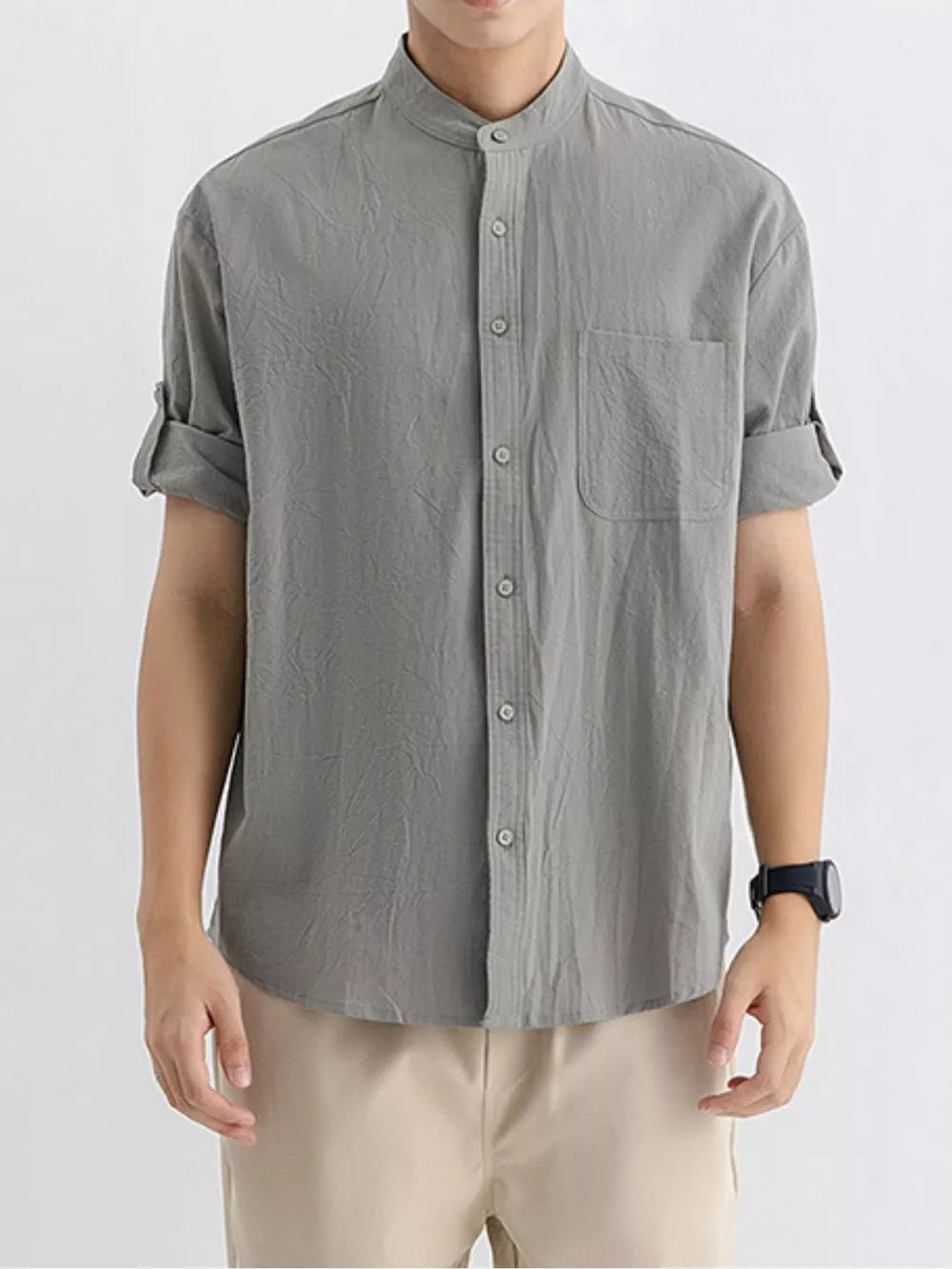 Men's gray textured short sleeve button-up shirt with mandarin collar and chest pocket