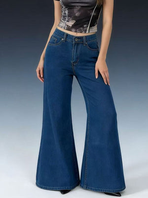 Maternity high-waisted flare jeans in dark wash denim with a comfortable cotton blend fabric.