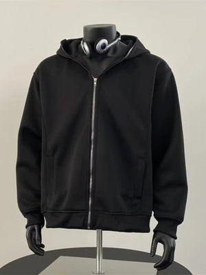 Black zip-up hoodie with a comfortable fit and zippered pockets.