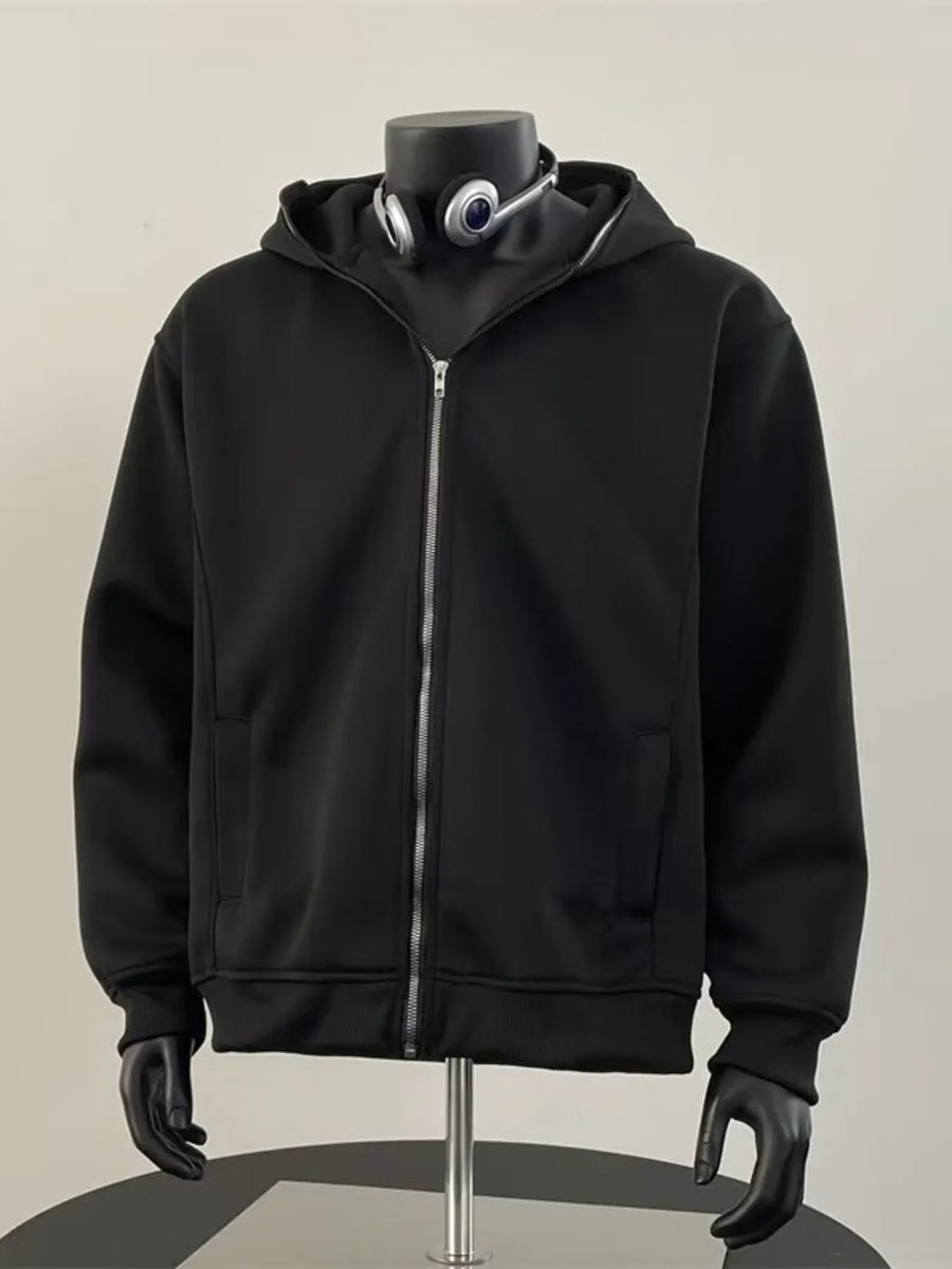Black zip-up hoodie with a comfortable fit and zippered pockets.