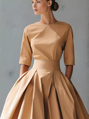 Camel A-line midi dress with pleated skirt and belted waist