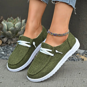 Army green linen-blend boat shoes with white laces and contrast sole.