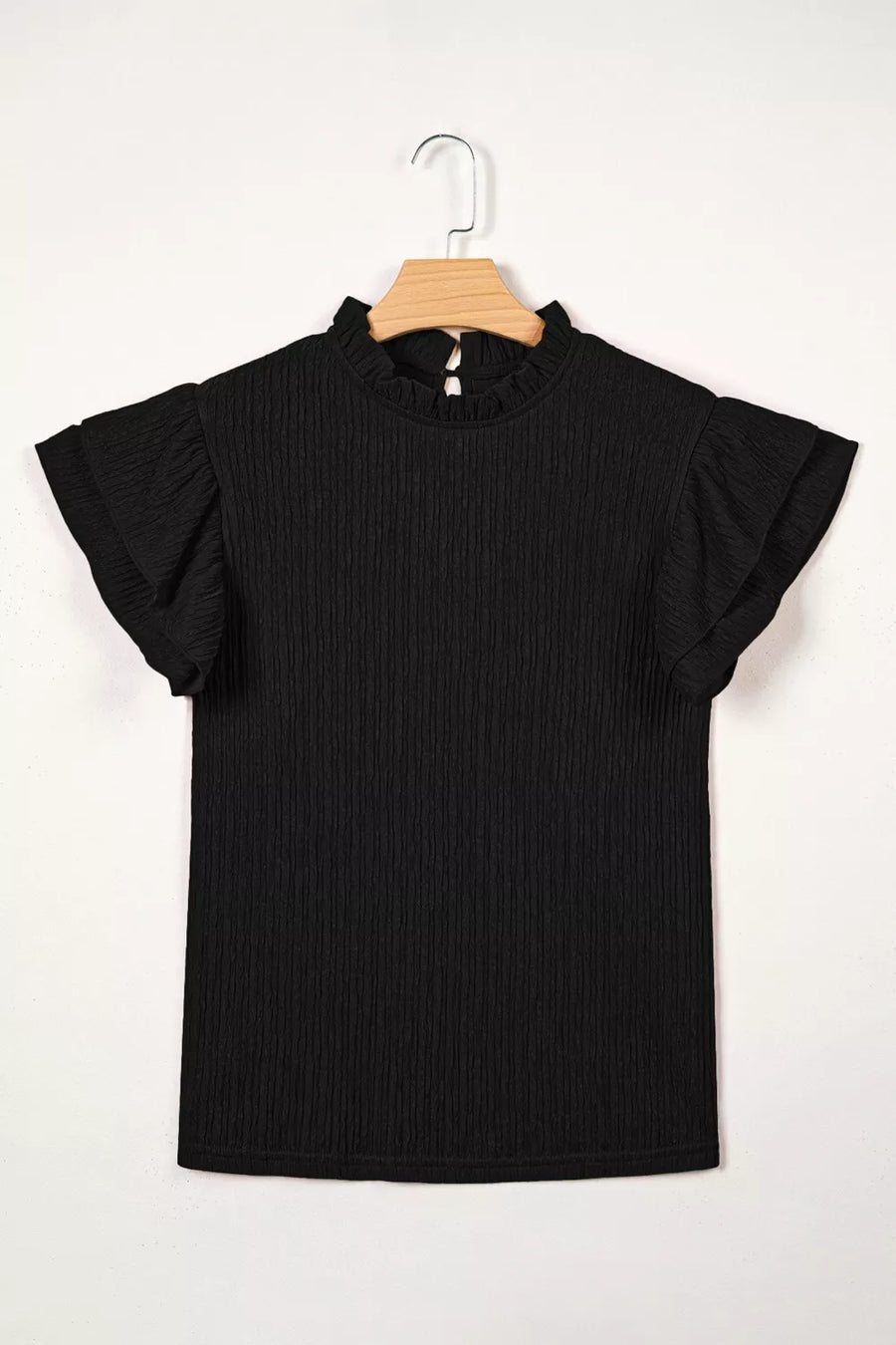 Black textured maternity shirt with frilled ruffle sleeves and mock neck.