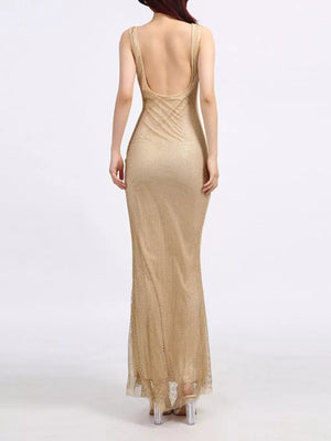 Gold mesh maxi dress with a low scoop back and sleeveless design.