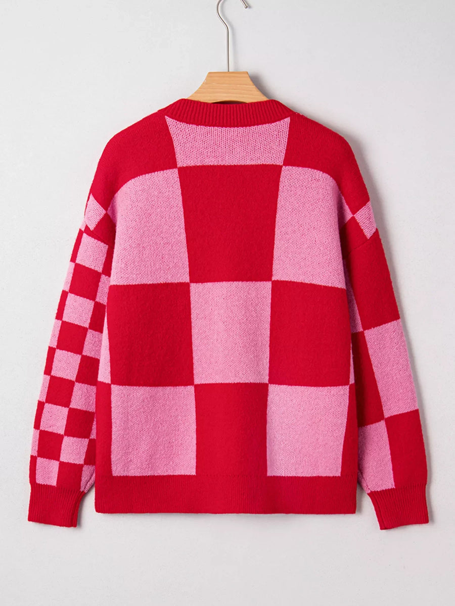 Checkerboard knit cardigan in deep rose and pink with a crew neck.