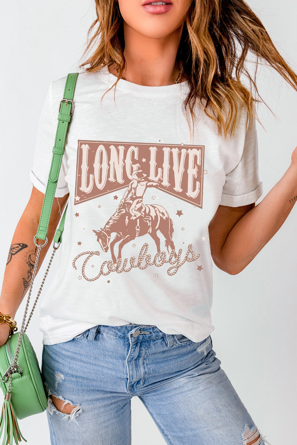 White graphic t-shirt with rodeo cowboy and "Long Live Cowboys" text.