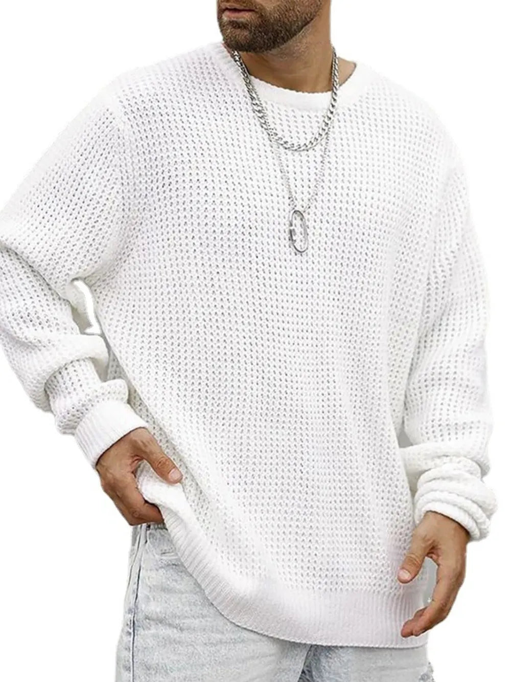 White waffle knit crewneck sweater with relaxed fit and ribbed cuffs and hem.