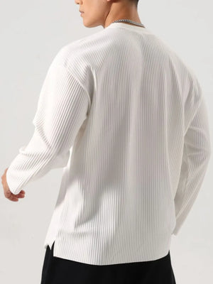White textured ribbed long sleeve oversized tee with crew neck.