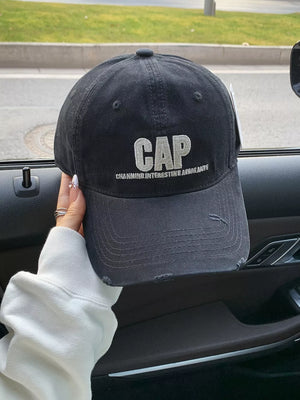 Distressed navy blue cotton baseball hat with embroidered CAP detail