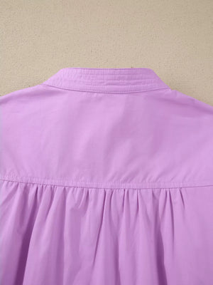 Purple cotton shirt with notched collar and gathered detail at the yoke.