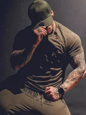 Muscle fit crew neck tee in olive brown with a subtle graphic detail.