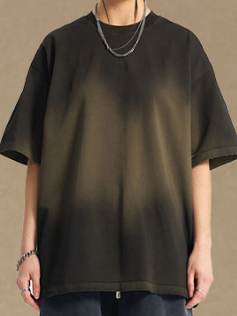 Oversized tee with faded ombre pattern in dark gray and olive green.