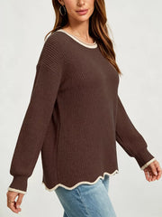 100% polyester Care instructions: Machine wash cold pullover sweater in ivory with regular silhouette