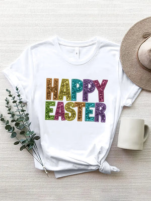 White t-shirt with glitter lettering that says Happy Easter in rainbow colors.