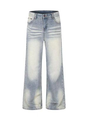 Men's light wash vintage distressed wide leg cotton jeans with a relaxed fit.