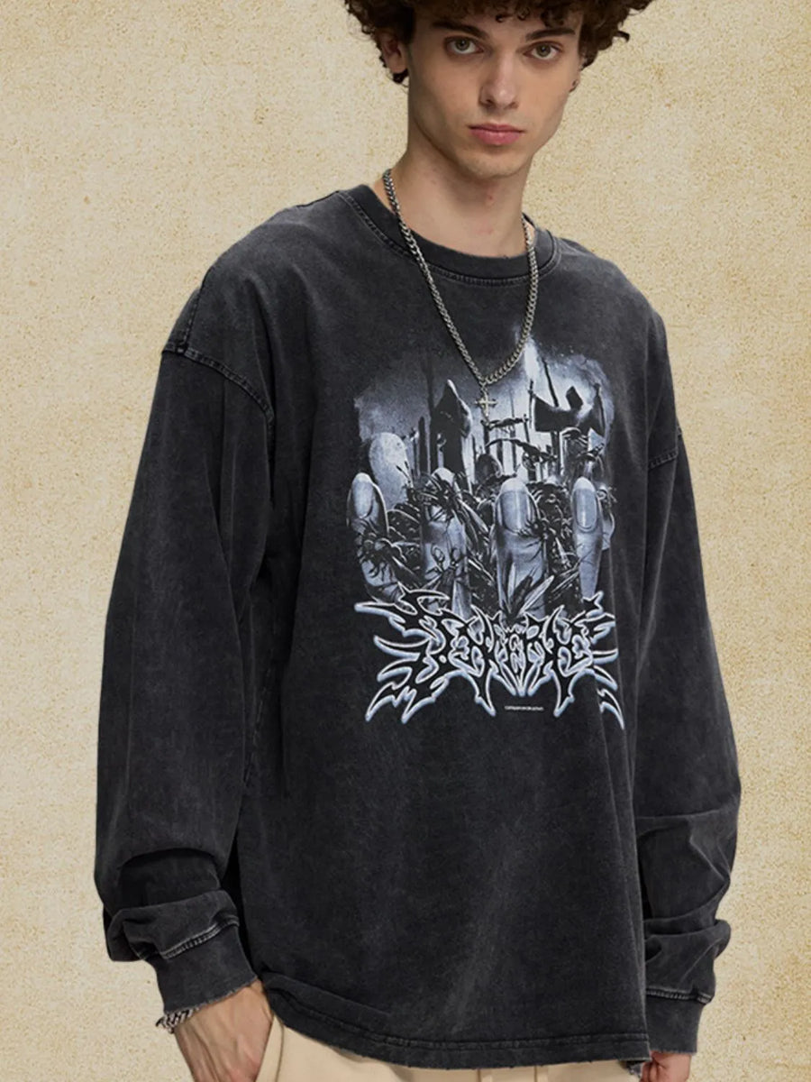 Washed black oversized long sleeve t-shirt with a graphic print and distressed details.