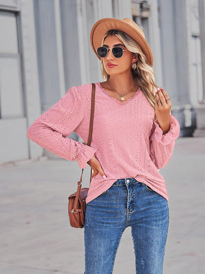 Blush pink lace-cut prairie blouse with ruffled sleeves and V-neck