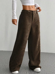 Brown corduroy wide-leg trousers with front pockets and a comfortable fit.