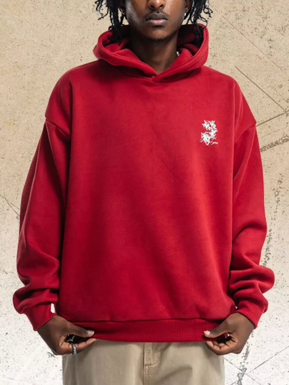 Red cotton blend graphic sweatshirt with crew neck and long sleeves.