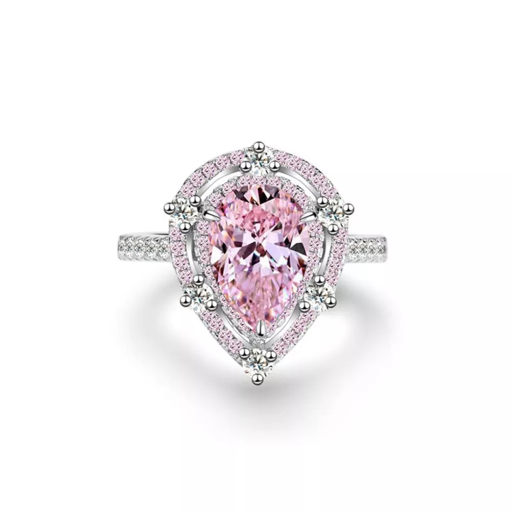 ring in pink featuring pear-cut stone and geometric fit