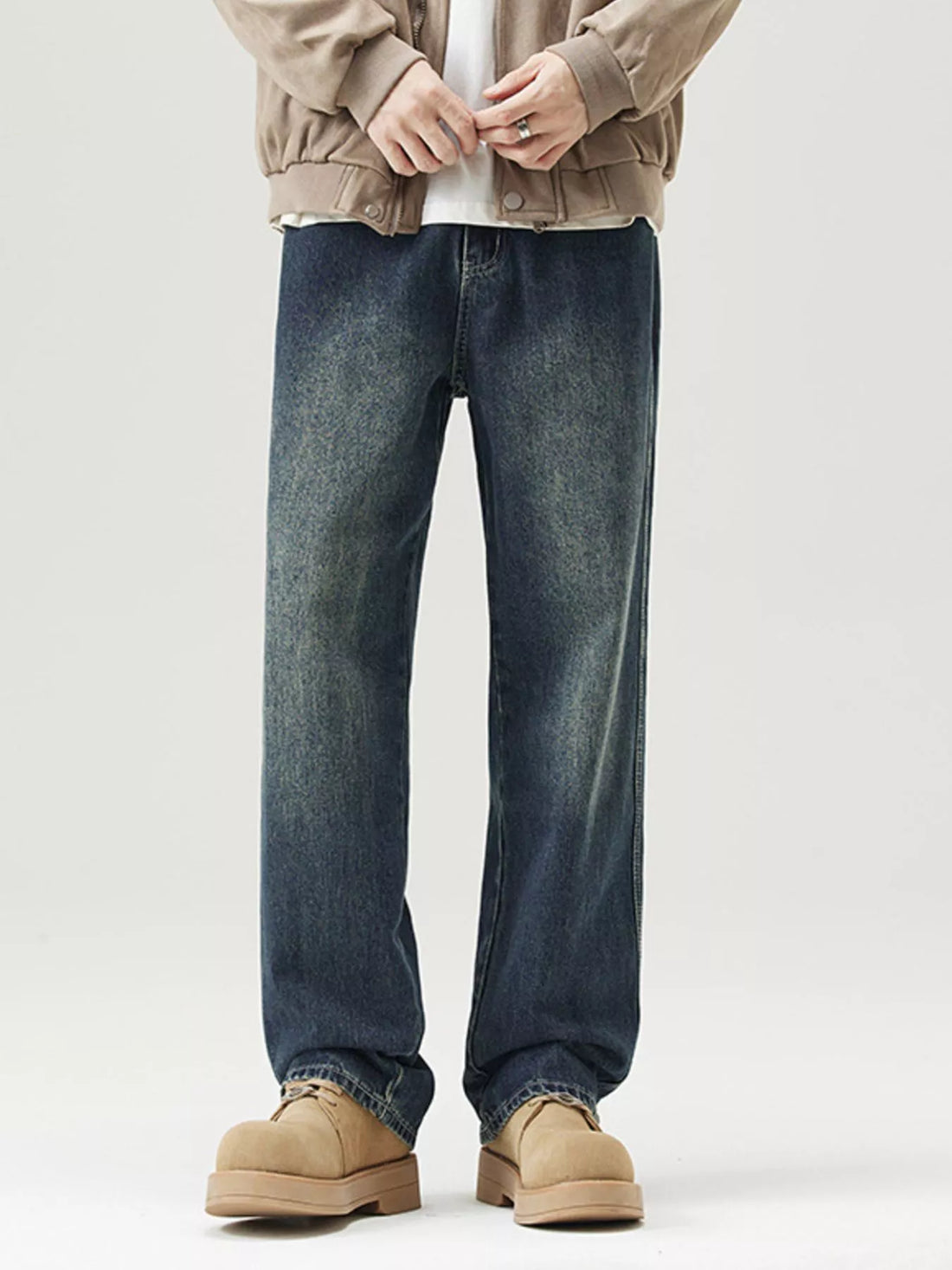 Relaxed fit vintage blue denim jeans with a washed look.