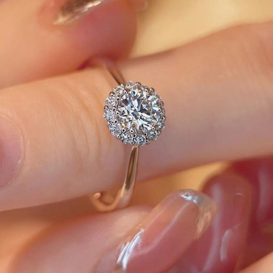 clear ring featuring moissanite and floral