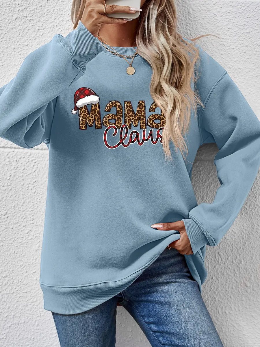 French Blue crewneck sweatshirt with leopard print "Mama Claus" graphic and Santa hat detail.