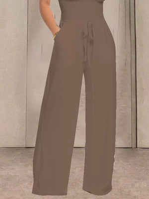 Brown wide leg pants with smocked waist and drawstring detail
