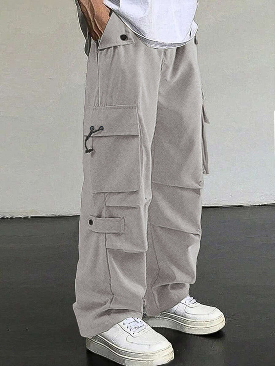 Light grey cargo pants with multiple pockets and drawstring details.