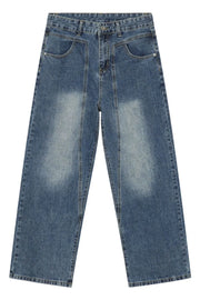 Panel seam wide leg jeans in medium wash denim with a relaxed fit.