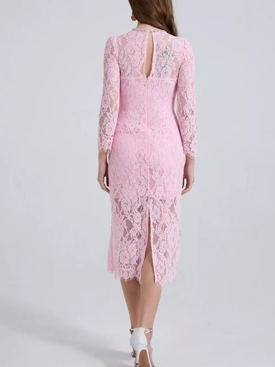 Pink lace midi dress with sheer long sleeves, high neckline, and back keyhole detail.