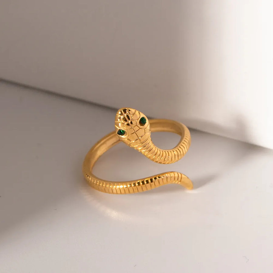 Gold ring featuring adjustable and snakeskin