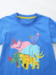 Blue cotton toddler t-shirt with colorful cartoon animal print featuring dinosaurs and jungle cats.