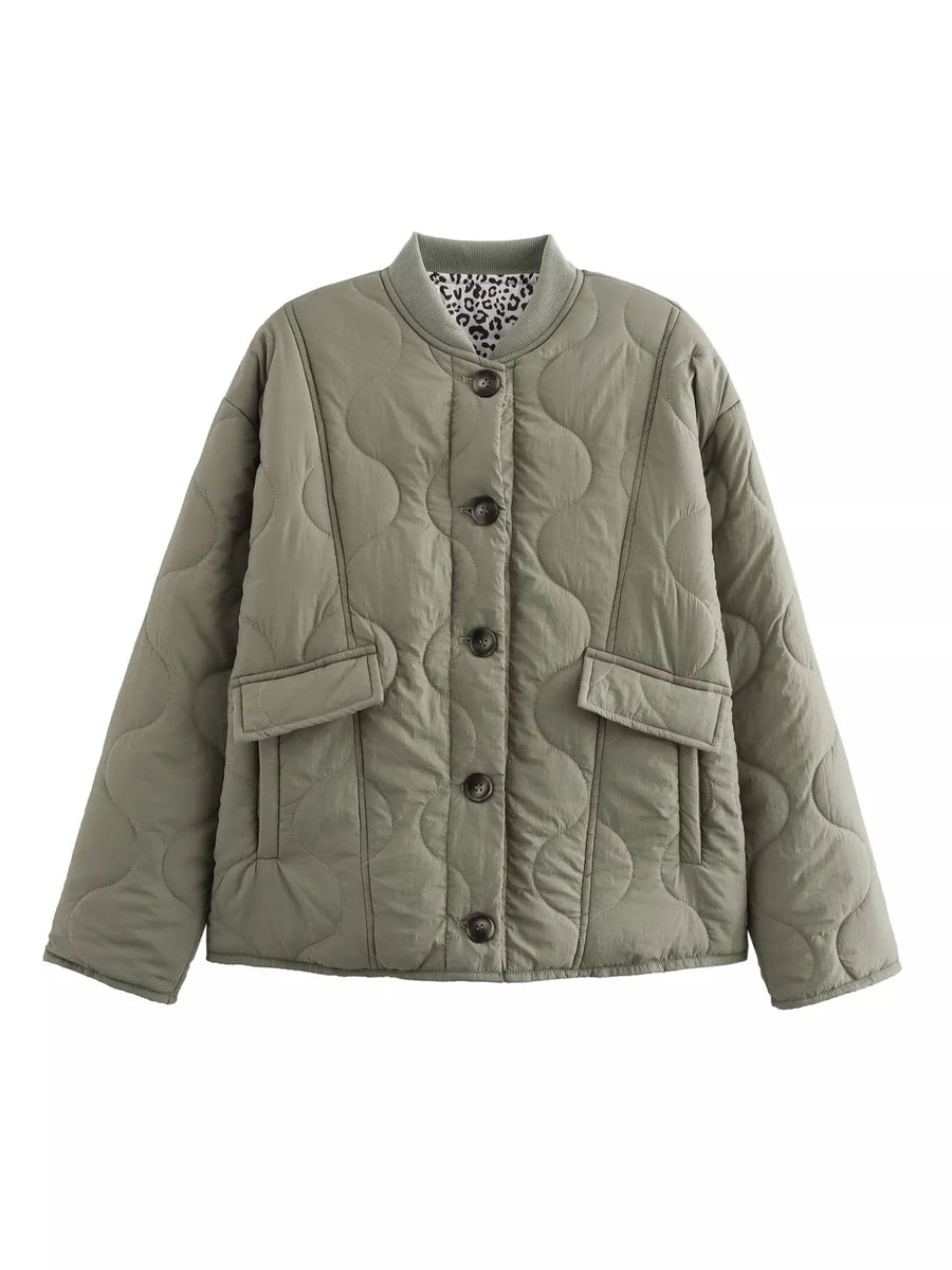 Moss quilted button-down jacket with leopard print lining and chest pockets.