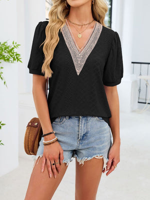 Black eyelet t-shirt with lace trim V-neck and puff sleeves