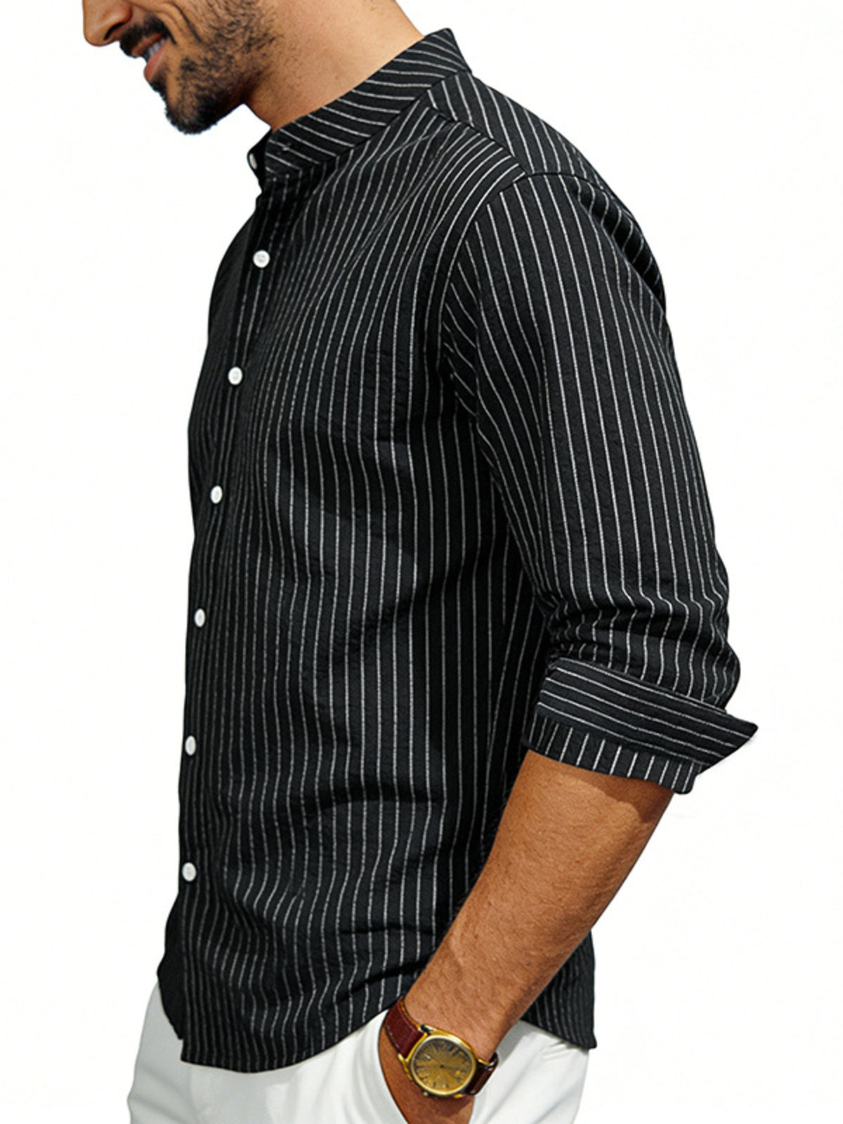 Black pinstripe long sleeve men's shirt with buttoned front and rolled cuffs.