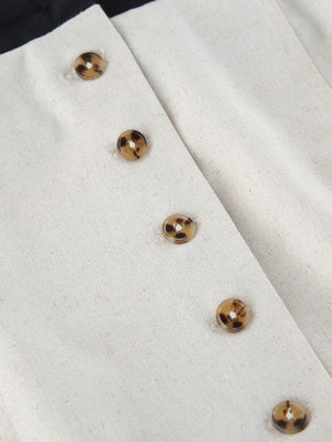 Beige cotton blend button front maxi dress detail with tortoise shell buttons