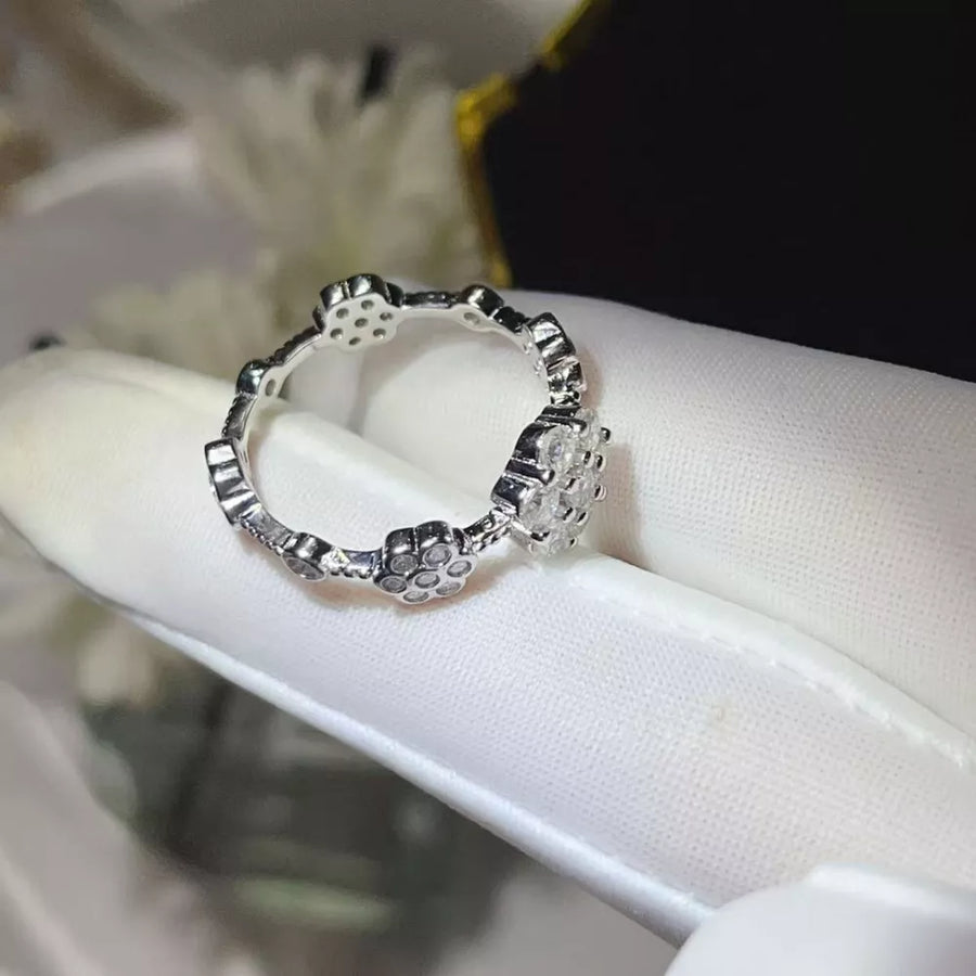 ring in Silver with floral and moissanite stones