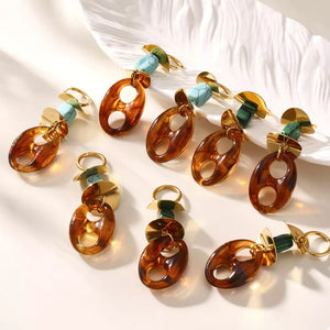 earrings featuring geometric in gold with 18K Gold-Plated, Resin, Stainless Steel, Turquoise Care instructions: Avoid wear