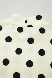Cream polka dot mock neck top