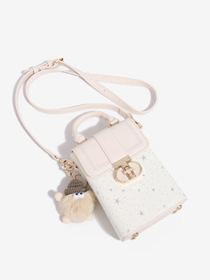 White crossbody bag with turn-lock and star-print
