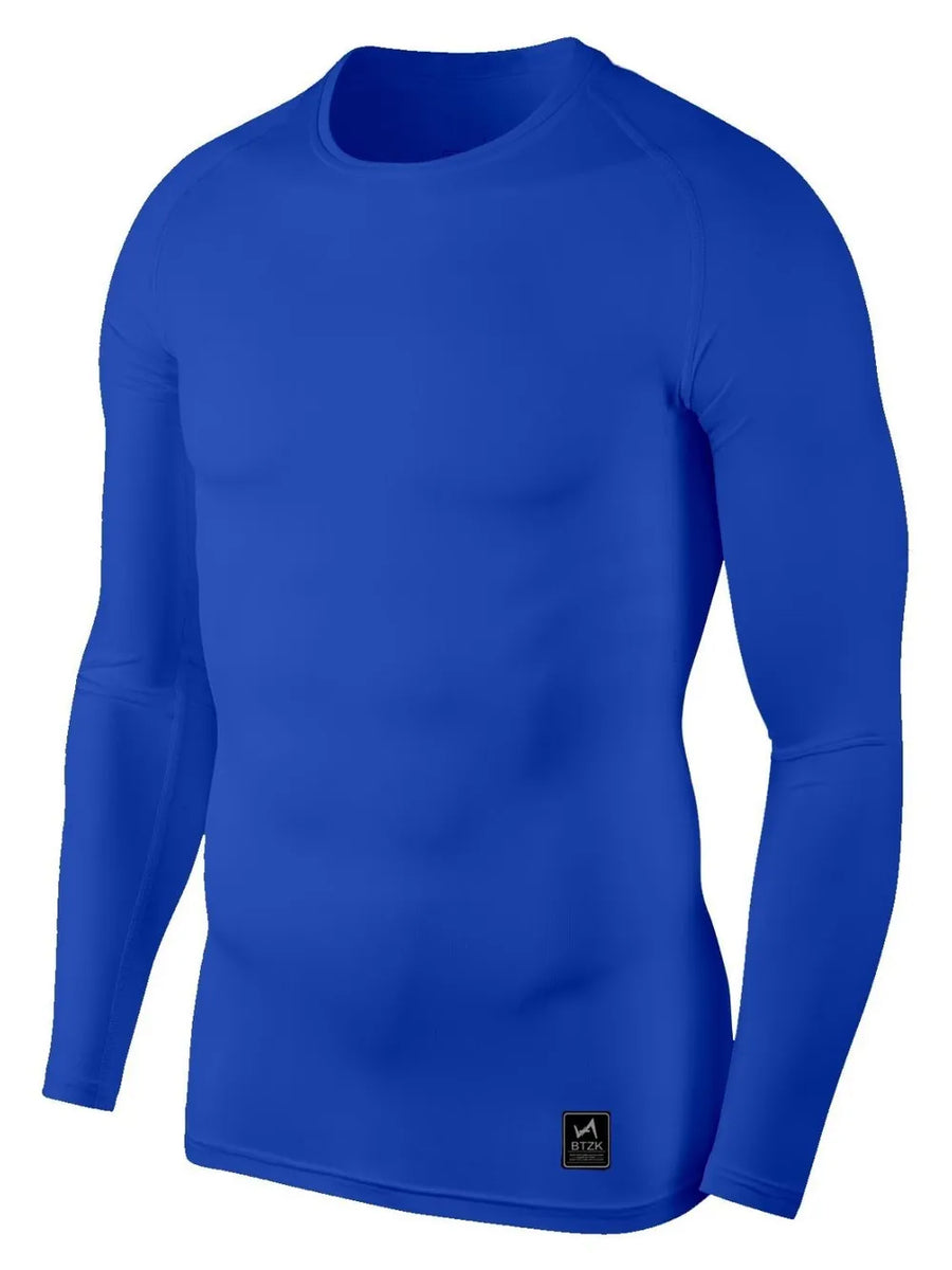 Royal blue long sleeve performance tee with crew neck and logo tag detail.