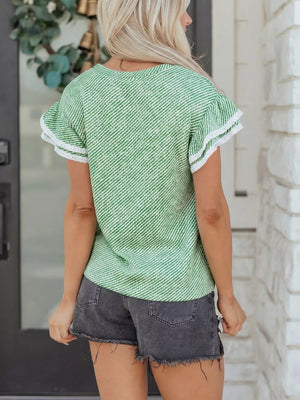 Women's green and white striped cotton blouse with ruffled sleeves and lace trim.