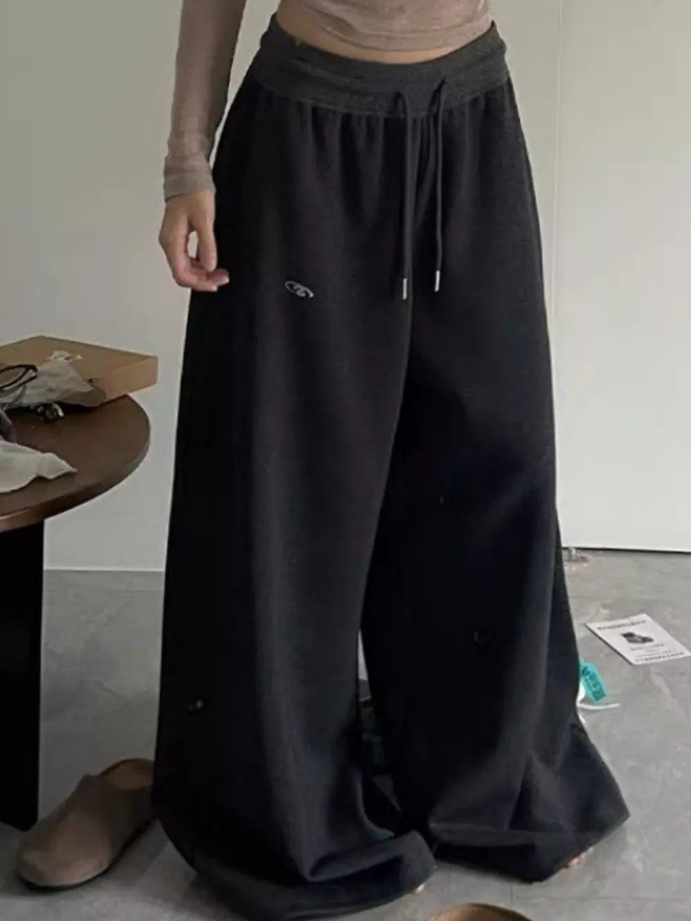 wide-leg pants in Dark Gray with drawstring waist and full-length